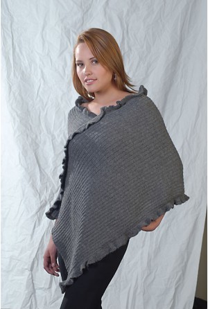 Channeled poncho with V-formed neck and ruffles