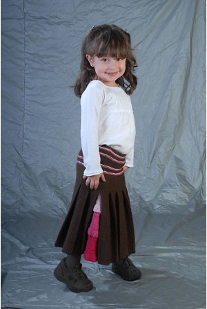 Folded skirt with color spray on one side