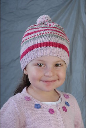 Bonnet with pink shapes